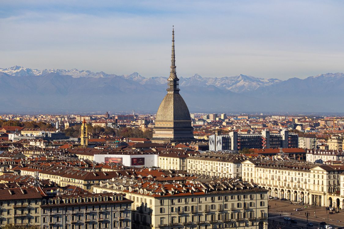Turin city skyline with Alps in background